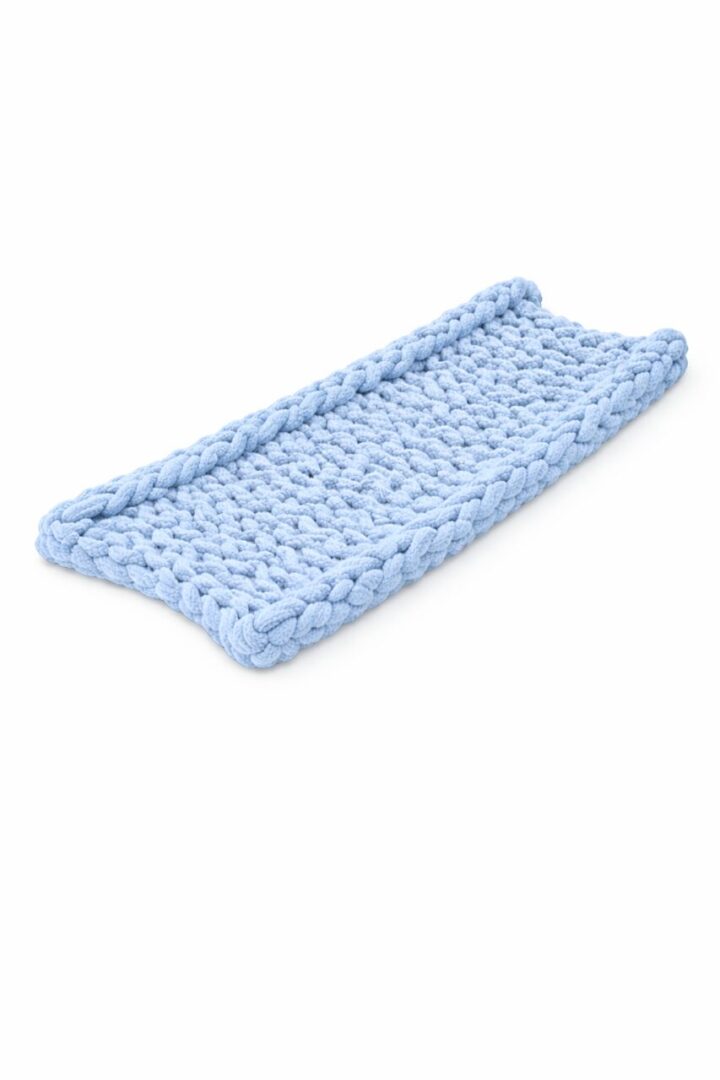 Light blue chunky knit scarf with a simple design.