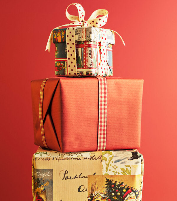 Stacked gift boxes with festive wrapping